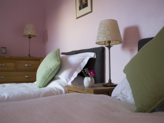 twin bedroom, complete with added pops of colour